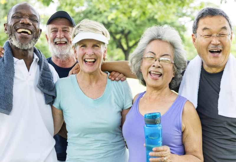 Older adults exercising outdoors in Montgomery County