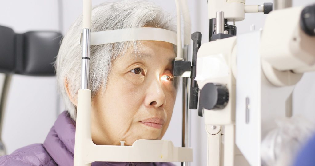 elderly lady having eye exam