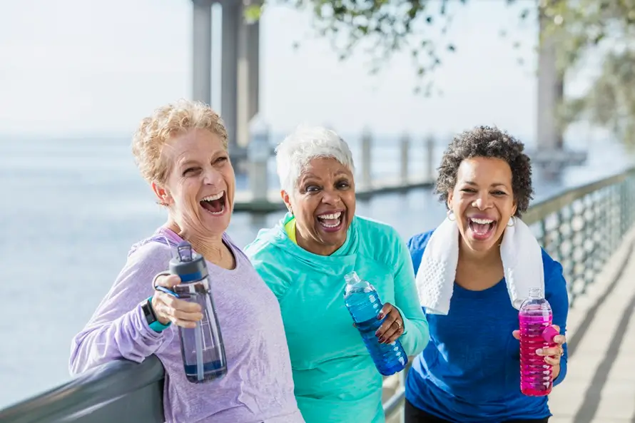 A group of older adult women exercising on a Maryland waterfront